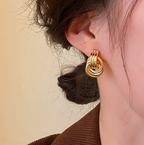 Twisted Gold Hoop Earrings: Bold Retro Style for Modern Looks